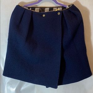 Thick blue wool wrap skirt with gold zipper detail